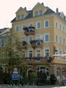Typical building with window flowers