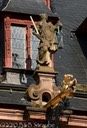 Statue concealing downspout